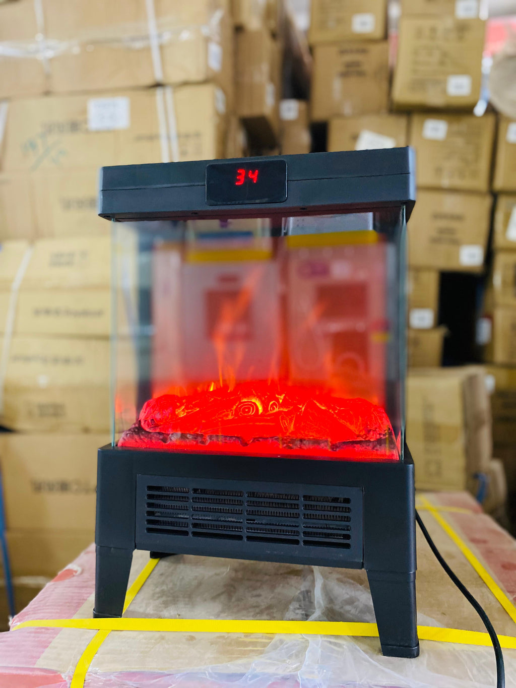 Flame effect electric heater, front view with fireplace glow