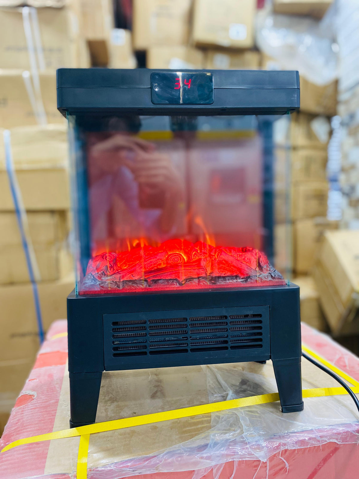 Flame effect display lit in a dark room