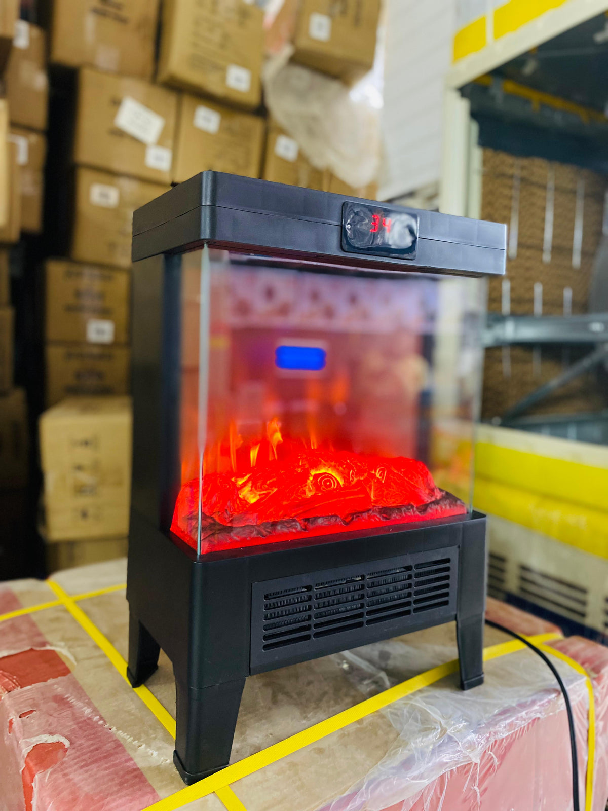 Flame effect heater on a table